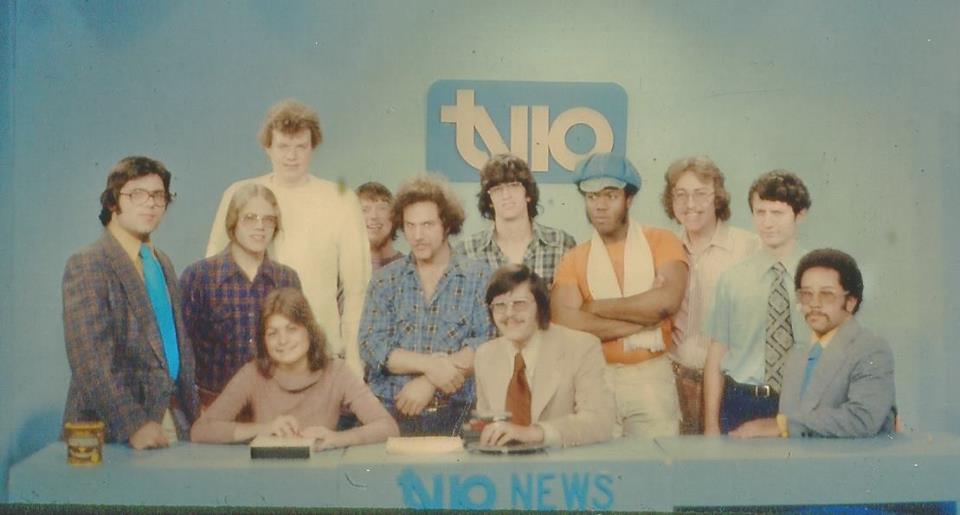 Students and staff posing at the tv10 studio